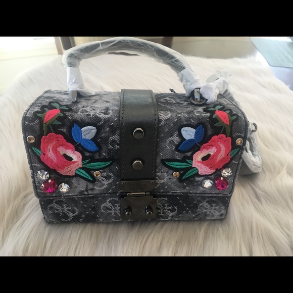 Guess Handbags - Guess Badlands Signature Denim Trunk Top.